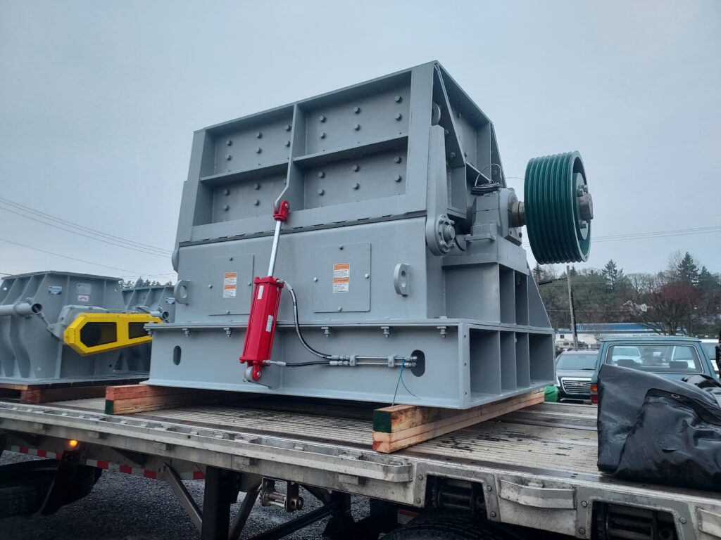 vertical grinder loaded on truck