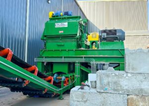 West Salem 4864GRI-HP grinder and infeed used to repurpose wood waste